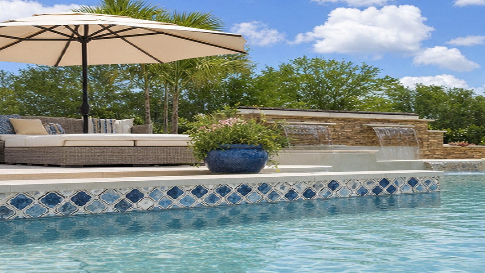 Pool Tile Ideas with a shade umbrella