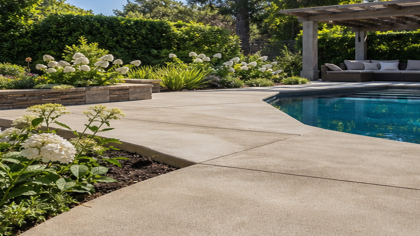 Poolside Garden Ideas with a natural concrete deck look
